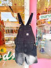 Load image into Gallery viewer, Distressed black Carhartt overall shorts
