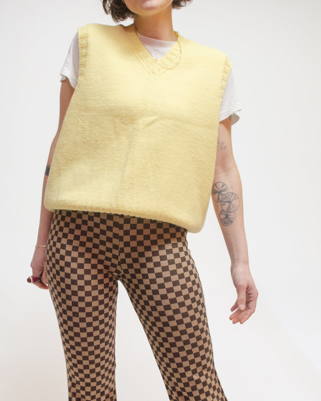 Yellow knit sweater vest