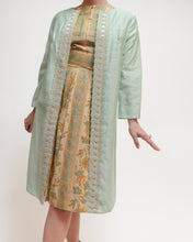 Load image into Gallery viewer, Spearmint evening coat with floral appliqué trim
